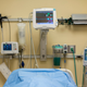 The body of a brain-dead potential organ donor lies covered on a bed at Mid-America Transplant Services in St. Louis.